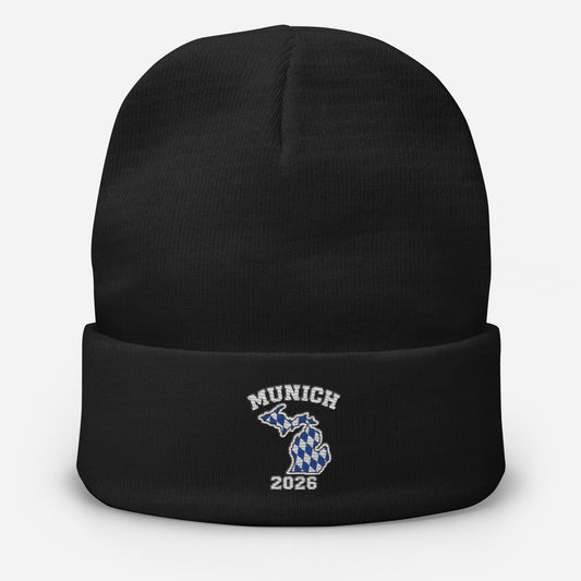 Black Munich 2026 Michigan beanie with blue-and-white Bavarian checker embroidery, front view